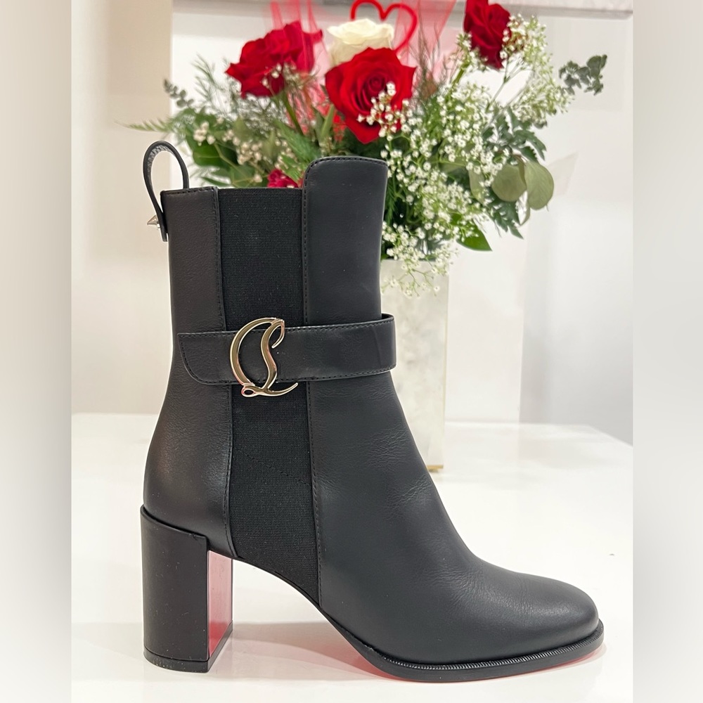 Christian Louboutin 
Leather CL Buckle Red Sole Chelsea Boots
